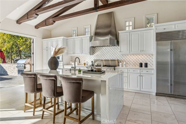 a bathroom with a tub and sink