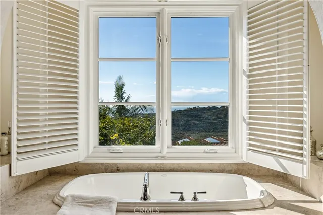 a view of a dining table and chairs in the patio