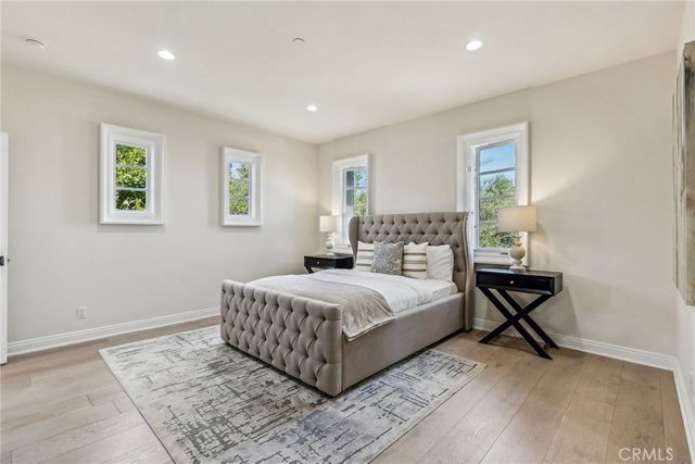 a view of a park with large trees