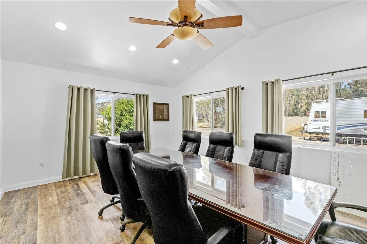 5461 Rainbow Creek Road Fallbrook, CA 92028 - Photo 10 of 36 a view of a dining room with furniture window and outside view