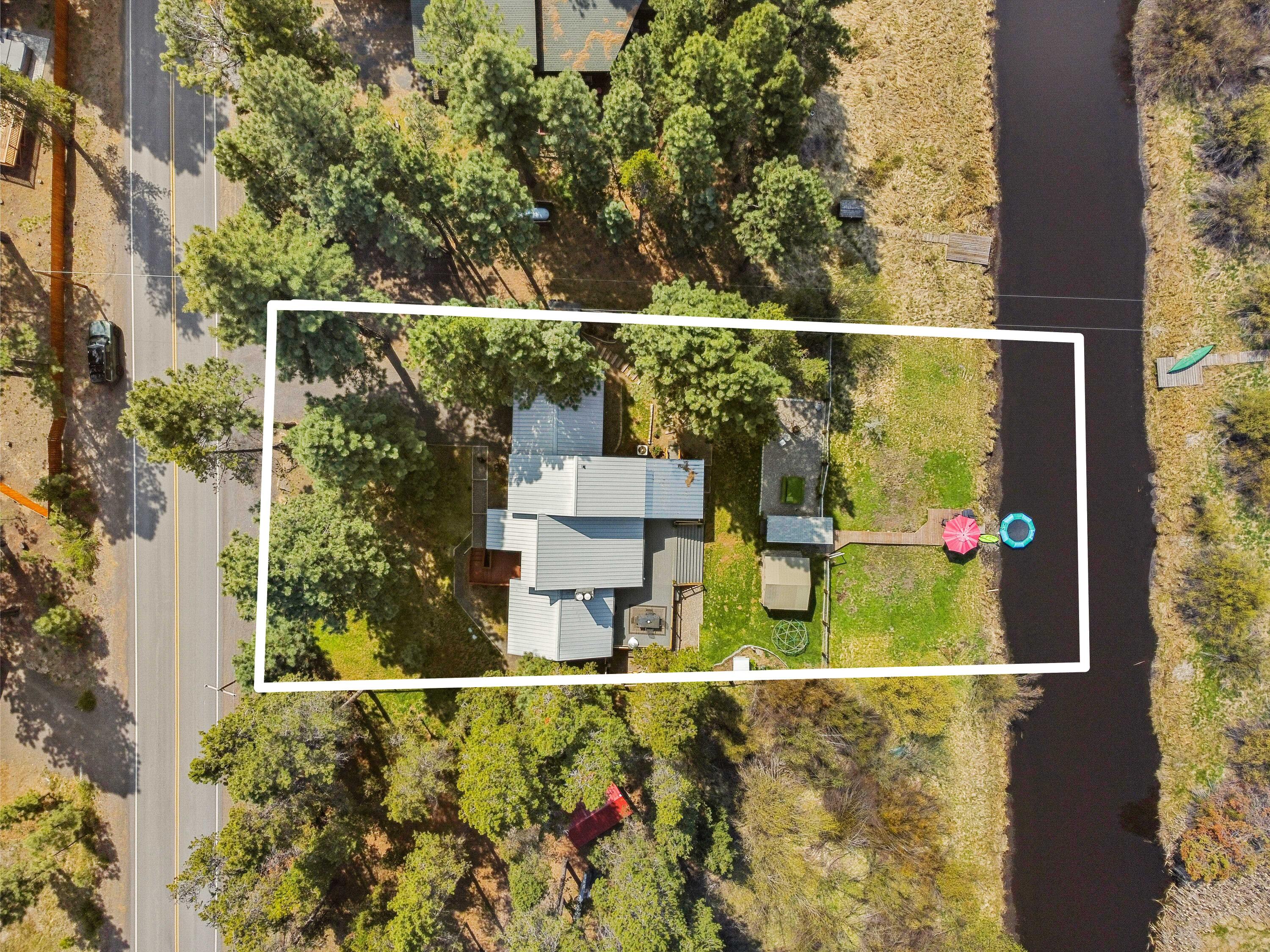 17062 Milky Way Bend, OR 97707 - Photo 2 of 39 Property positioned along the river with road access and forested privacy