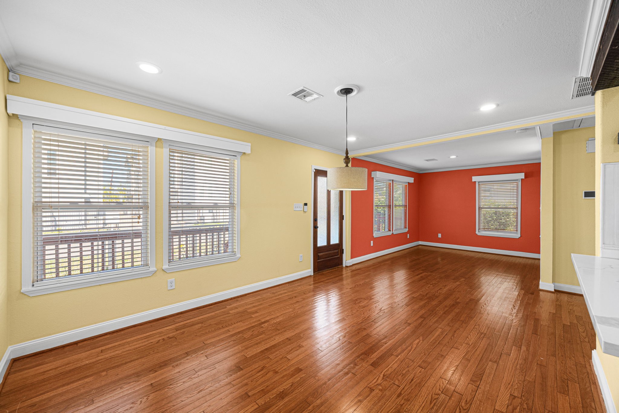 710 East 28th Street Houston, TX 77009 - Photo 19 of 44 a view of an empty room with wooden floor and a window