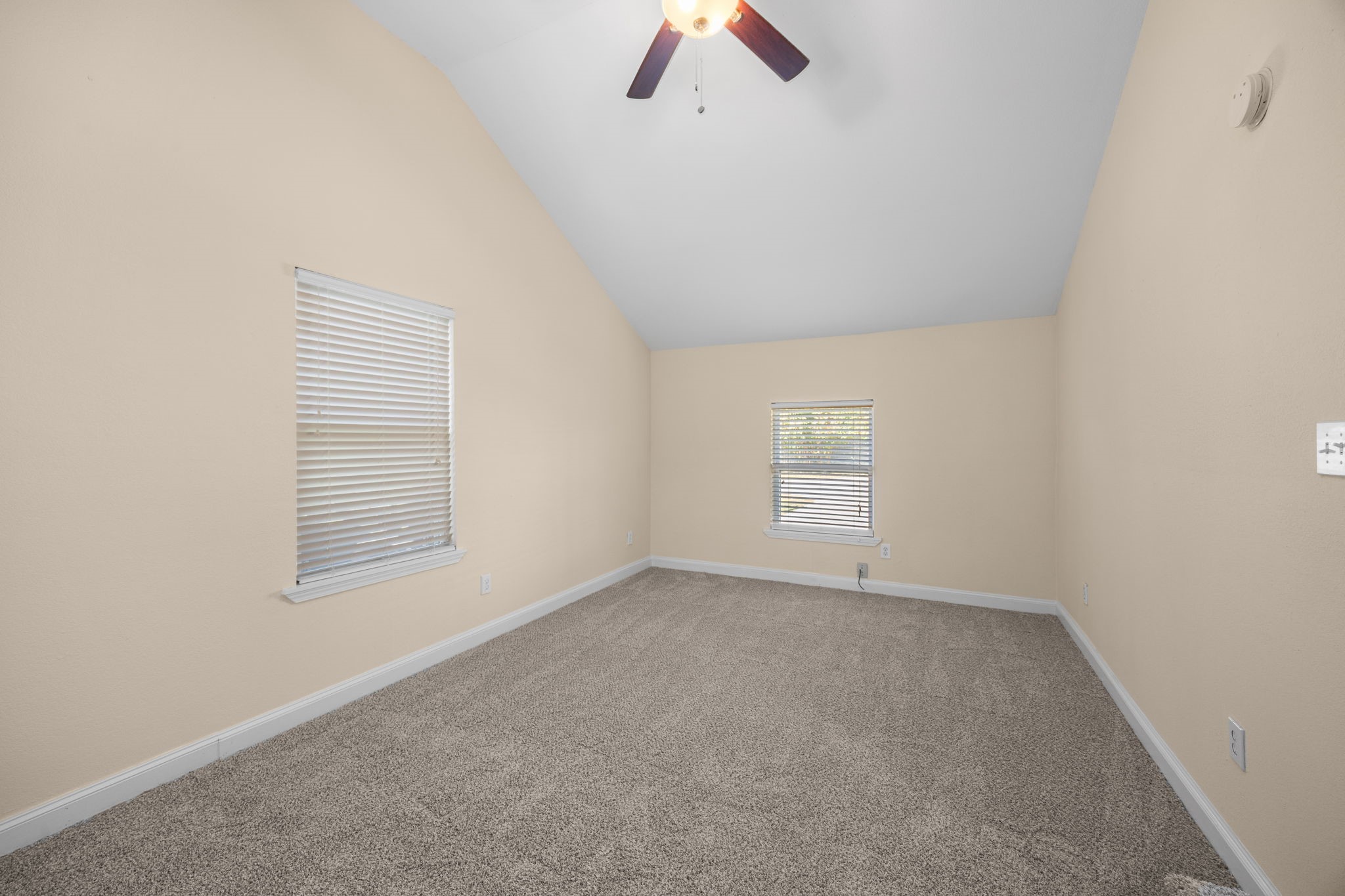 710 East 28th Street Houston, TX 77009 - Photo 31 of 44 an empty room with a window and a ceiling fan