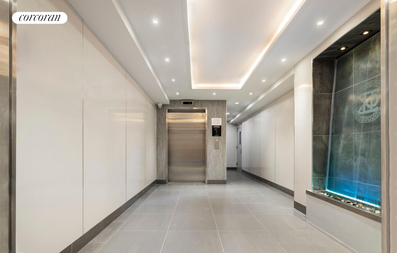 23-16 31st Avenue, Unit 2B Queens, NY 11106 - Photo 6 of 10 a view of a hallway with wooden floor