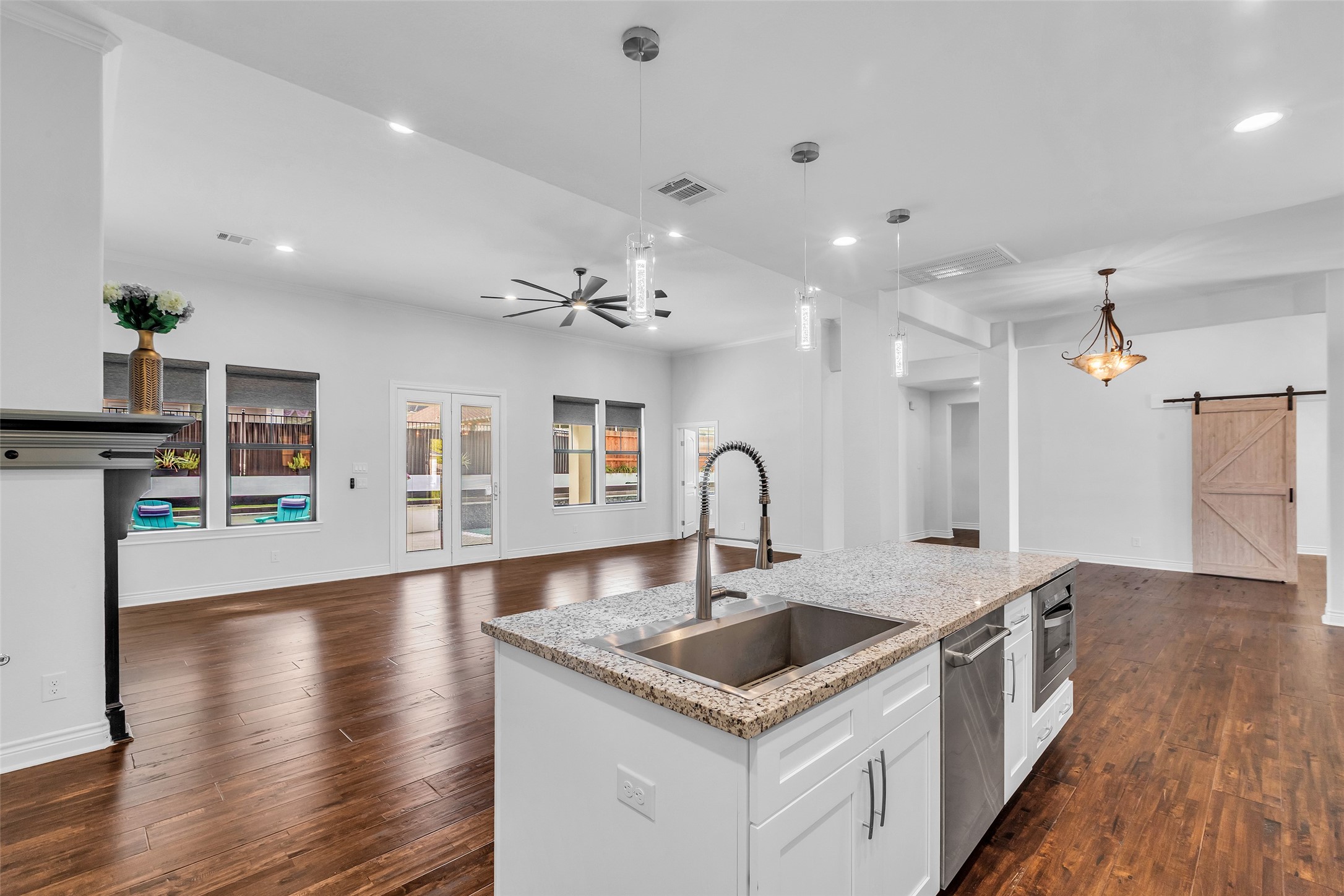 17 Bellingham Court Montgomery, TX 77356 - Photo 12 of 47 a kitchen with sink stove and refrigerator