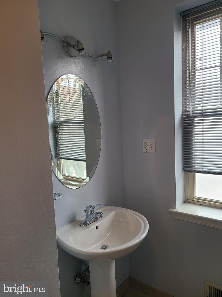 1918 Poplar Street, Unit 2 Philadelphia, PA 19130 - Photo 9 of 18 Bathroom on 2nd floor between kitchen & Bedroom