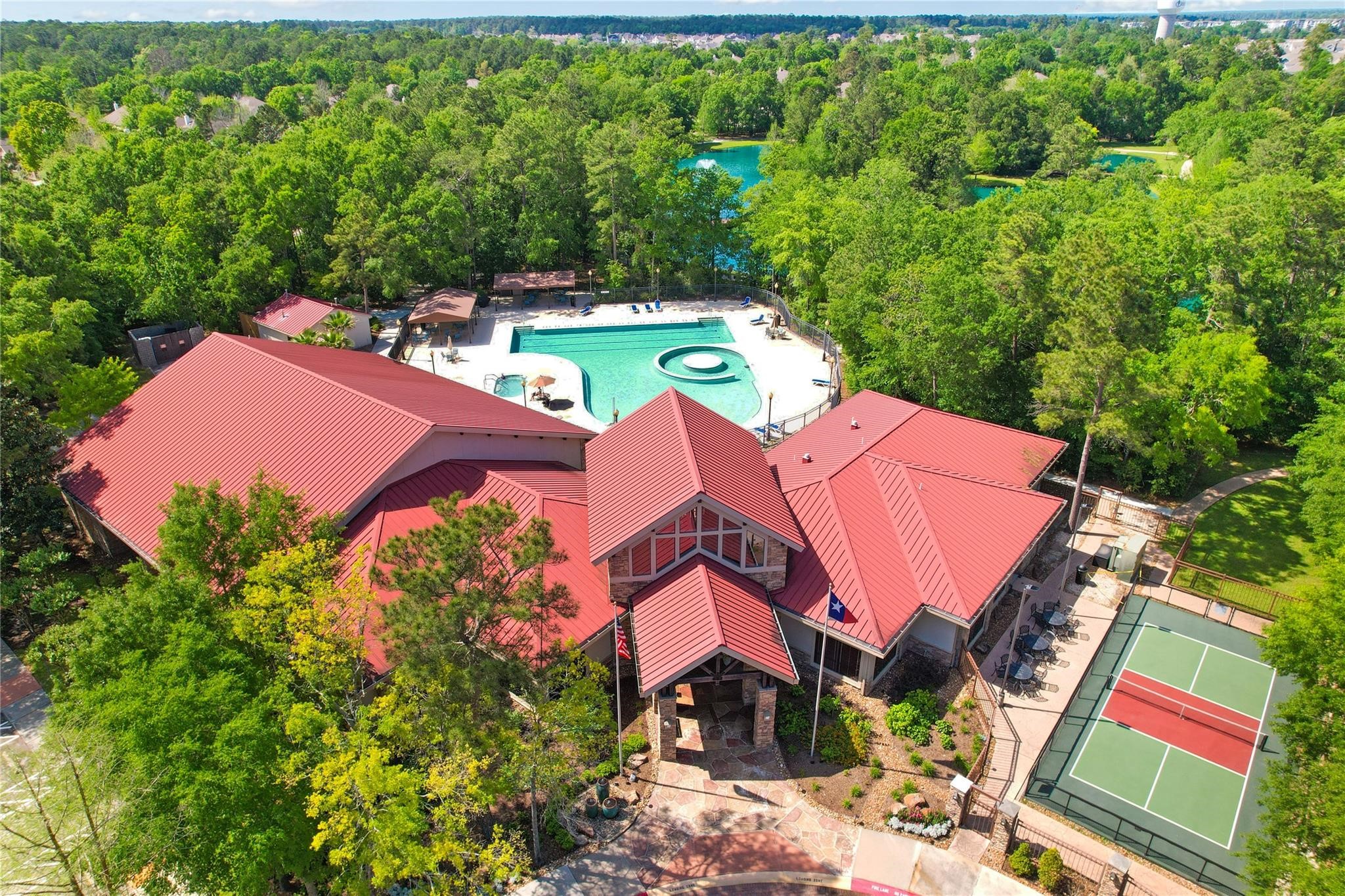 43 Tarrytown Way Conroe, TX 77384 - Photo 40 of 40 an aerial view of a house with yard swimming pool and outdoor seating