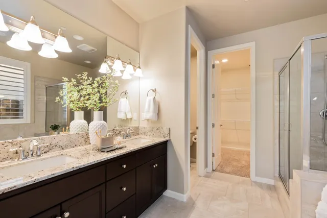 a bathroom with a bathtub and shower