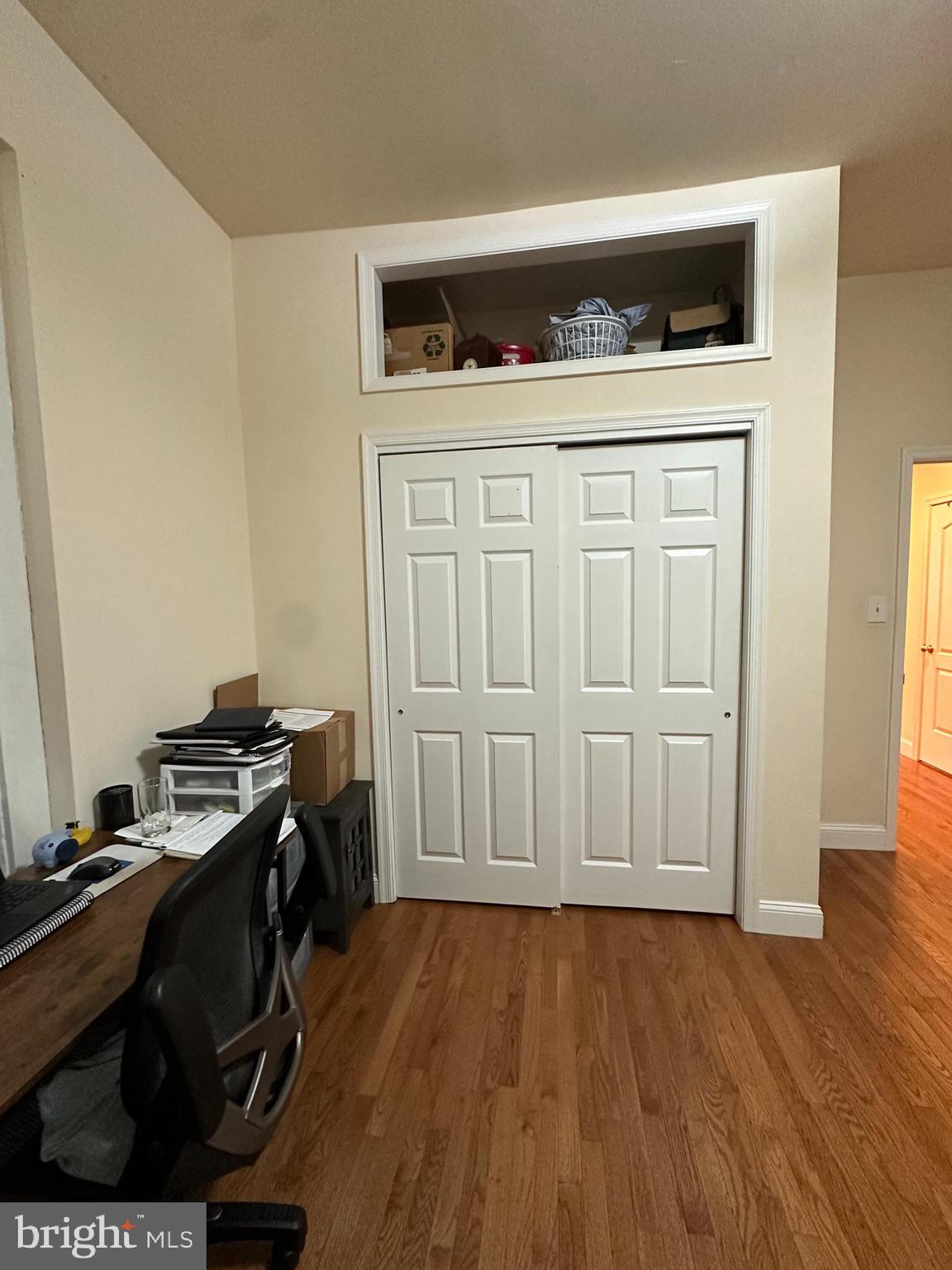 3900 Terrace Street, Unit 7 Philadelphia, PA 19128 - Photo 11 of 11 a hallway with a stove and wooden floor
