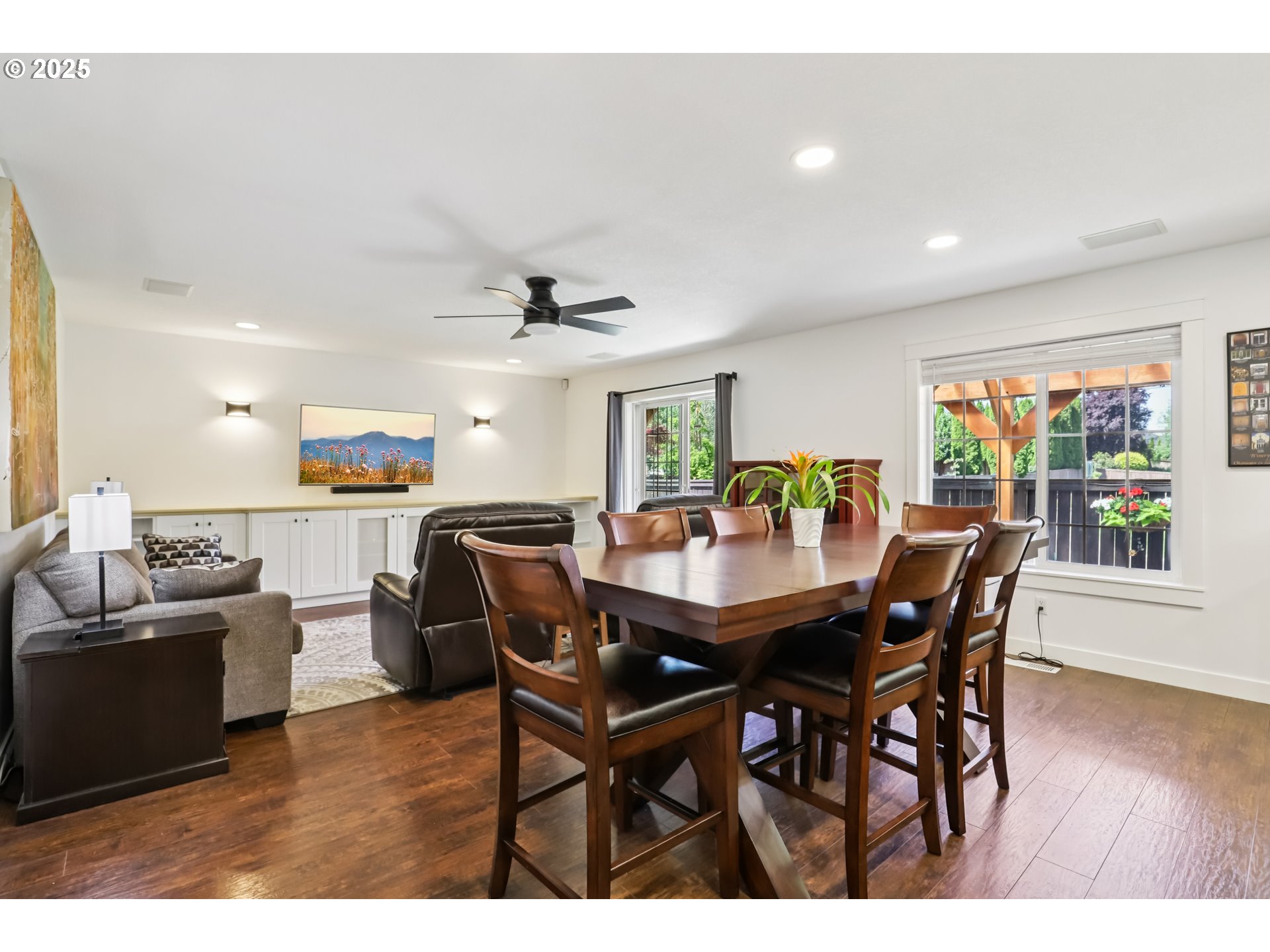 425 Northwest 151st Street Vancouver, WA 98685 - Photo 11 of 31 a view of a dining room with furniture and wooden floor