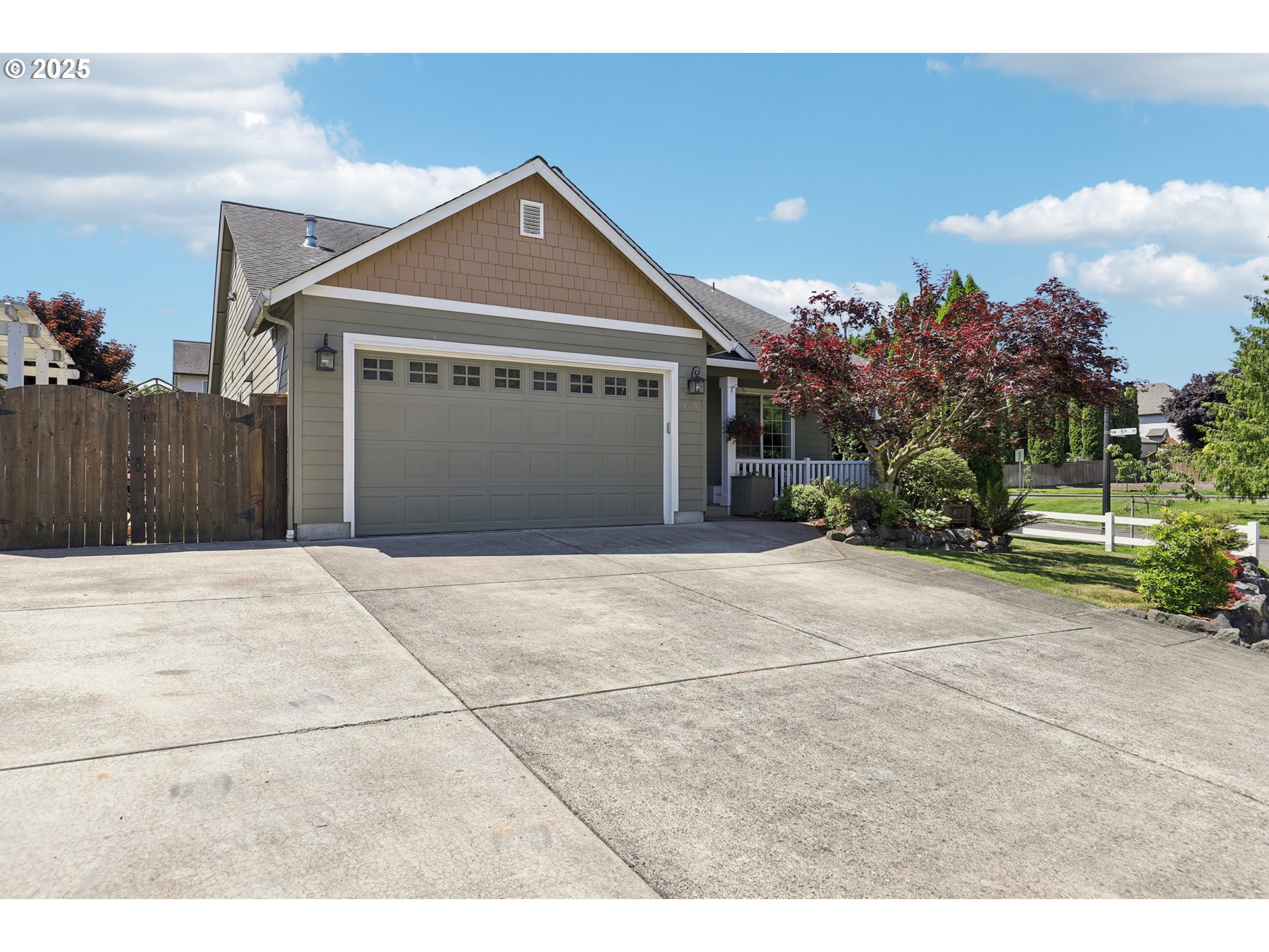425 Northwest 151st Street Vancouver, WA 98685 - Photo 2 of 31 a front view of a house with a yard