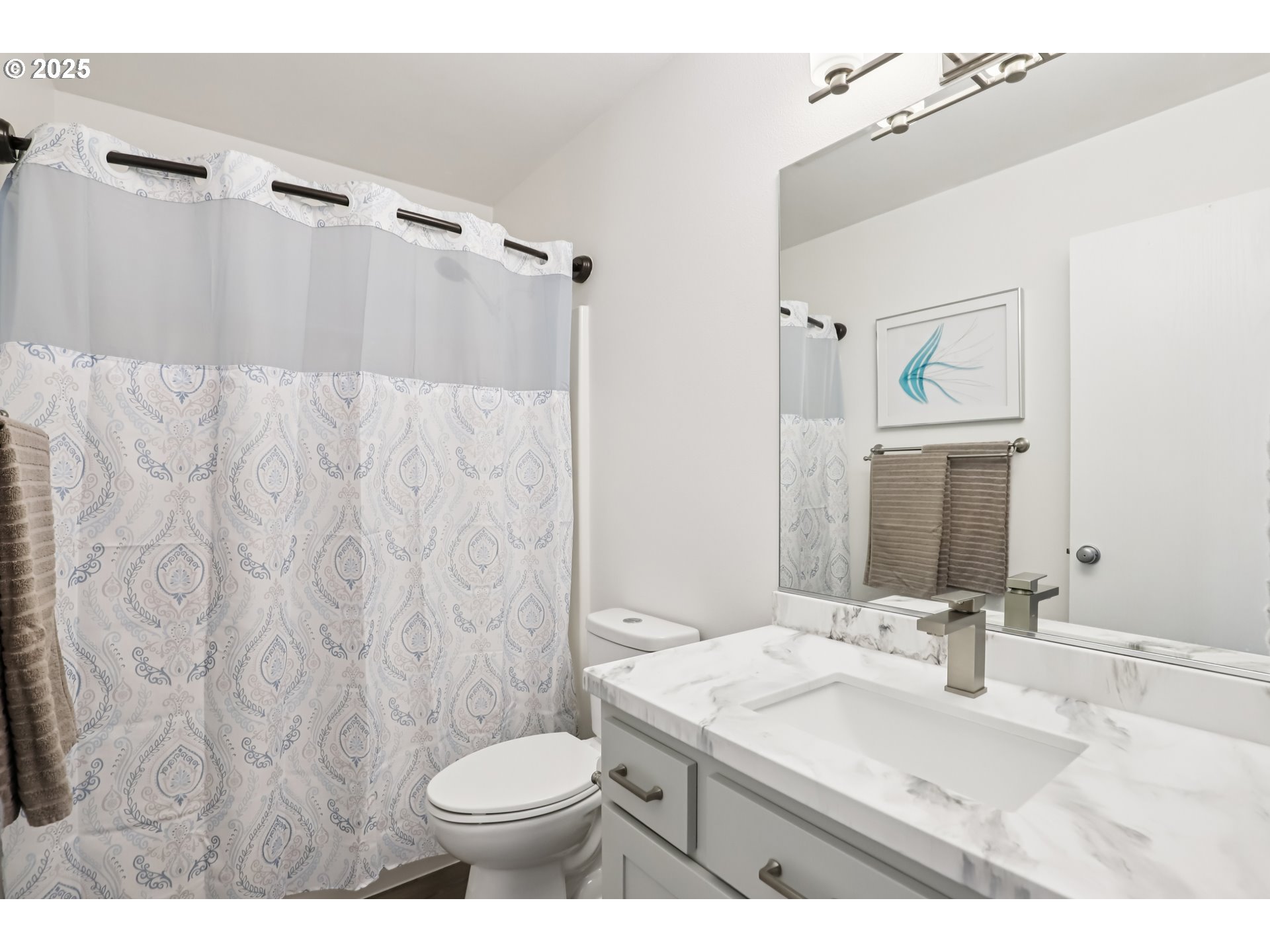 425 Northwest 151st Street Vancouver, WA 98685 - Photo 21 of 31 a bathroom with a sink toilet and shower