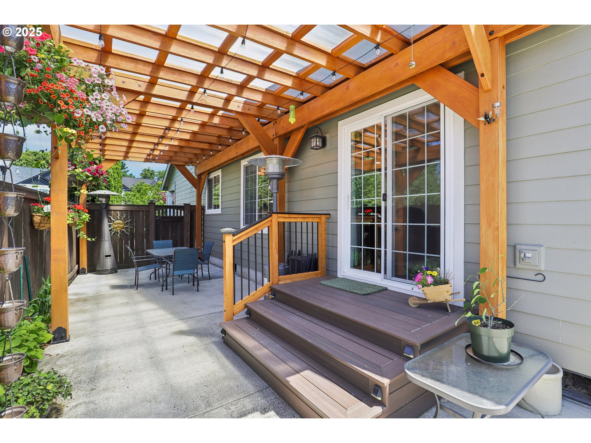 425 Northwest 151st Street Vancouver, WA 98685 - Photo 24 of 31 a view of a patio with a table and chairs