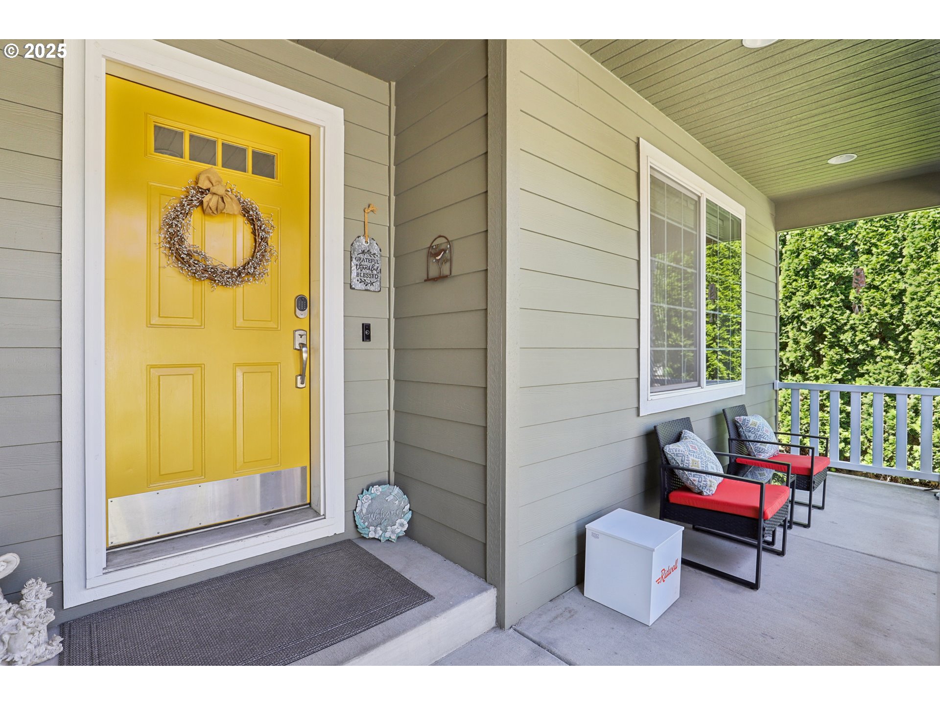 425 Northwest 151st Street Vancouver, WA 98685 - Photo 4 of 31 a outdoor living space with furniture and a window
