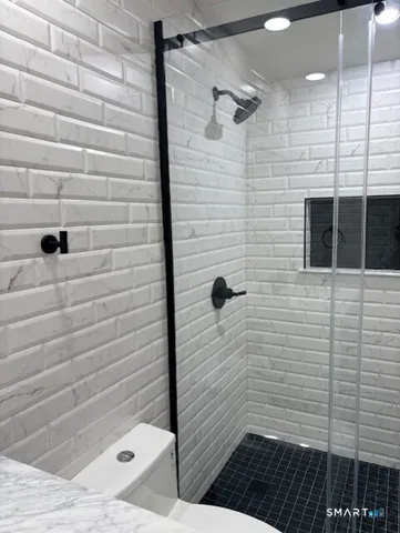 a bathroom with a toilet