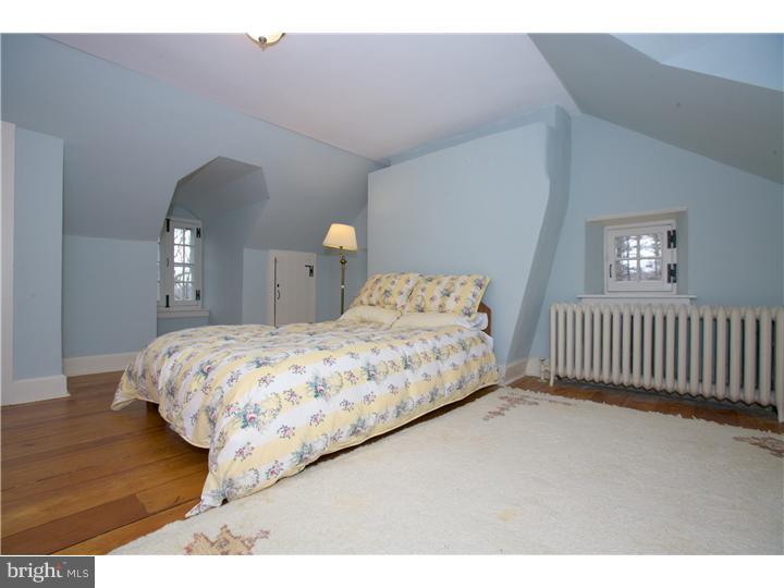 1515 Ridley Creek Road Media, PA 19063 - Photo 22 of 25 a bedroom with a bed and a window