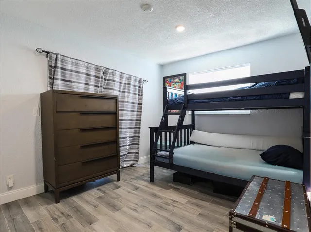 a living room with a couch and a stove