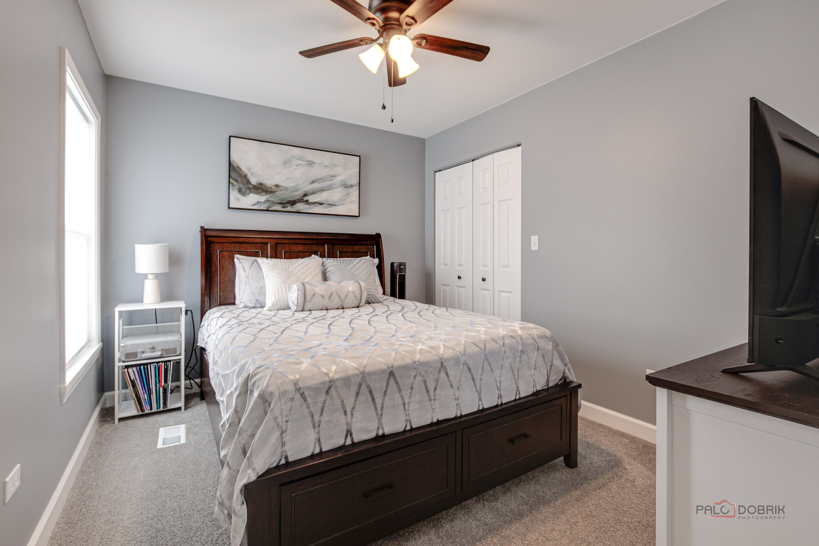 1502 Anderson Trail Zion, IL 60099 - Photo 19 of 30 a bedroom with a bed and a flat screen tv
