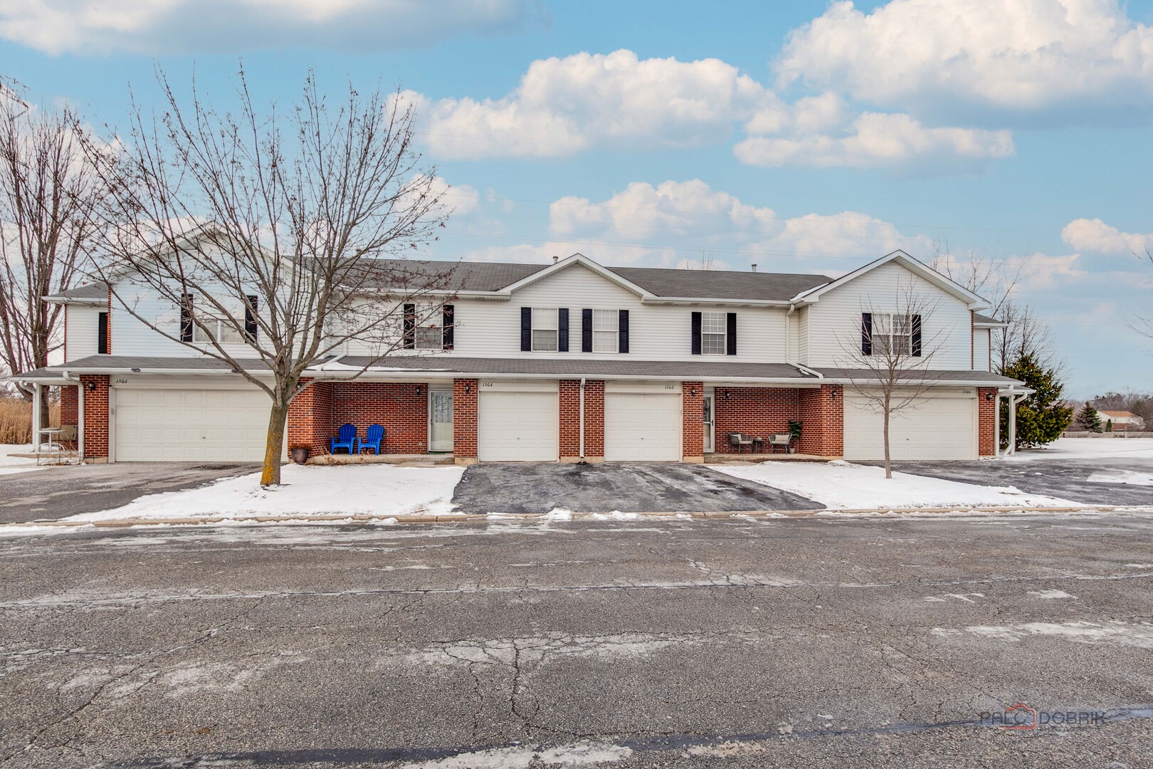 1502 Anderson Trail Zion, IL 60099 - Photo 2 of 30 a view of a house with a snow in front of it