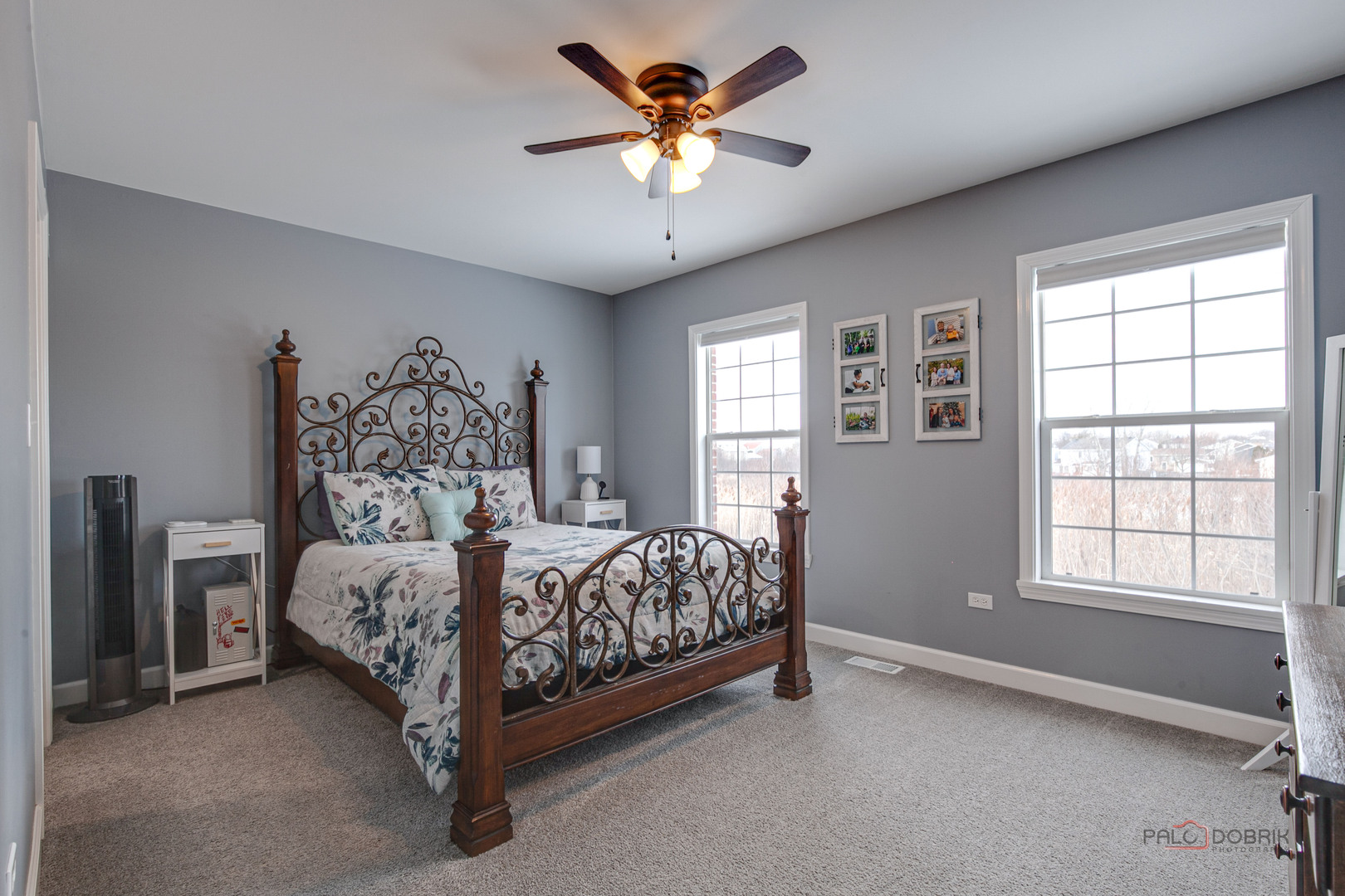 1502 Anderson Trail Zion, IL 60099 - Photo 21 of 30 a bed sitting in a bedroom next to a window