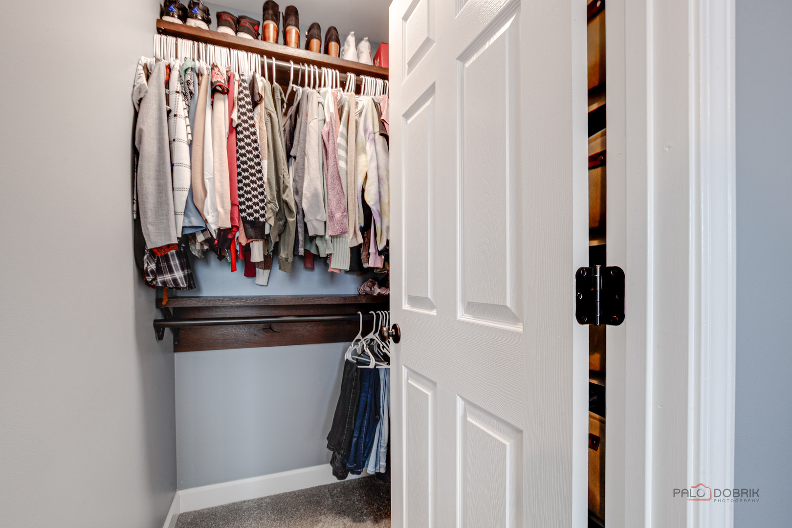 1502 Anderson Trail Zion, IL 60099 - Photo 24 of 30 a view of walk in closet with clothes and shoes