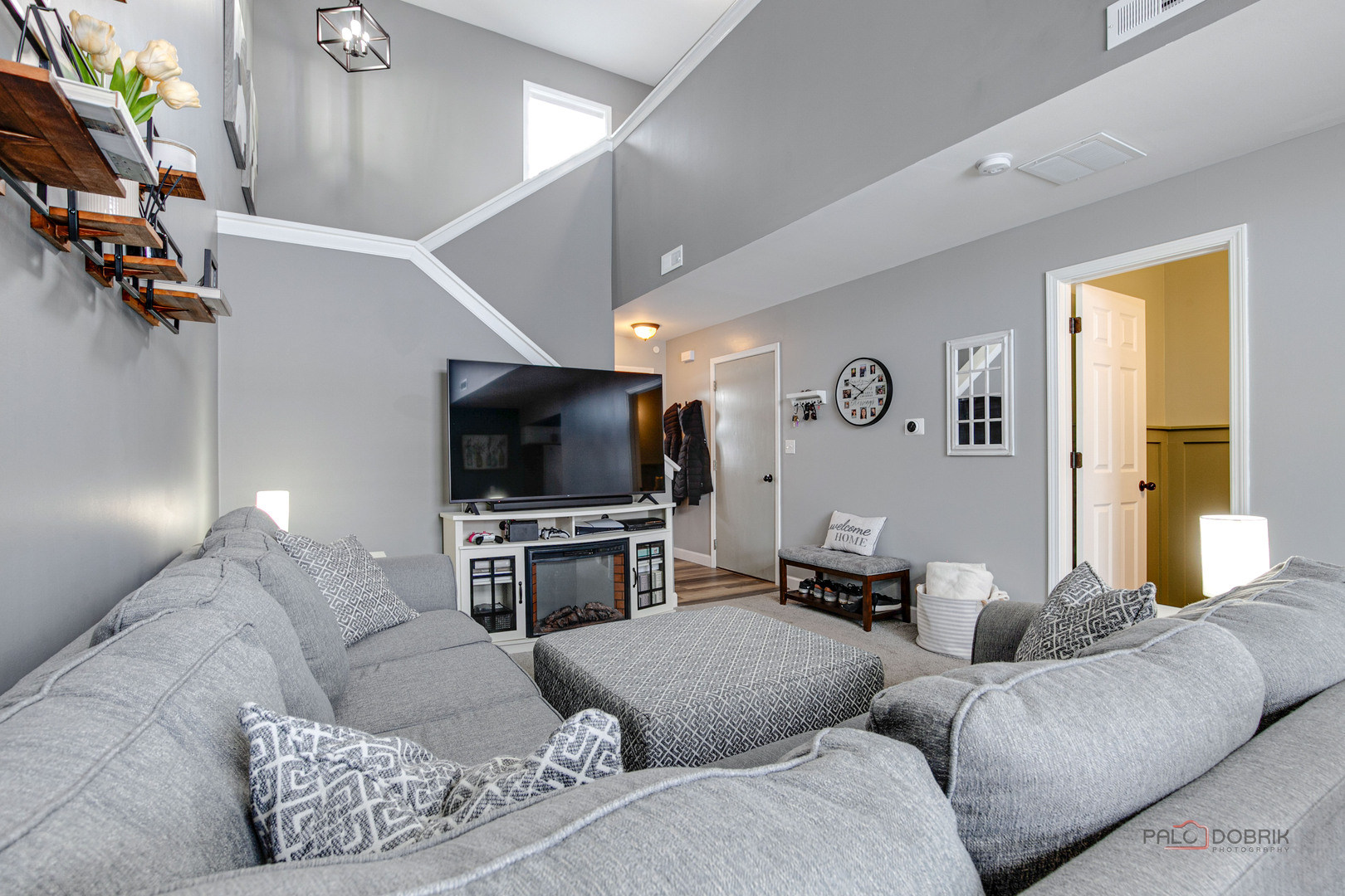 1502 Anderson Trail Zion, IL 60099 - Photo 6 of 30 a living room with furniture and a flat screen tv