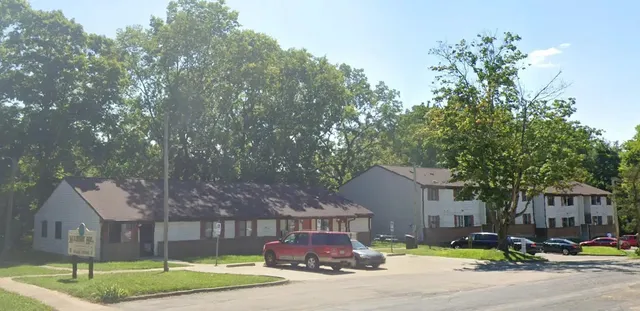 a view of a parked cars in front of house