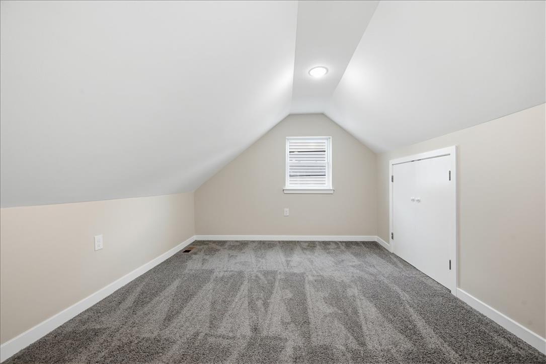 5641 North Coplay Road Whitehall, PA 18052 - Photo 45 of 68 A versatile bonus room offering adaptable space and sloped ceilings with a window for natural illumination.
