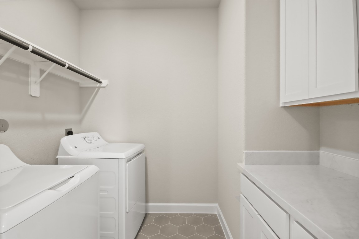136 Peninsula Point Drive Montgomery, TX 77356 - Photo 20 of 30 a utility room with dryer and washer