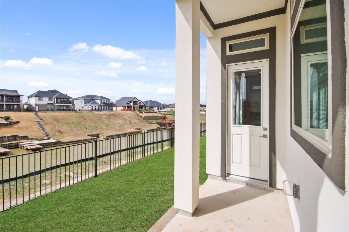136 Peninsula Point Drive Montgomery, TX 77356 - Photo 21 of 30 a view of a balcony with an ocean view