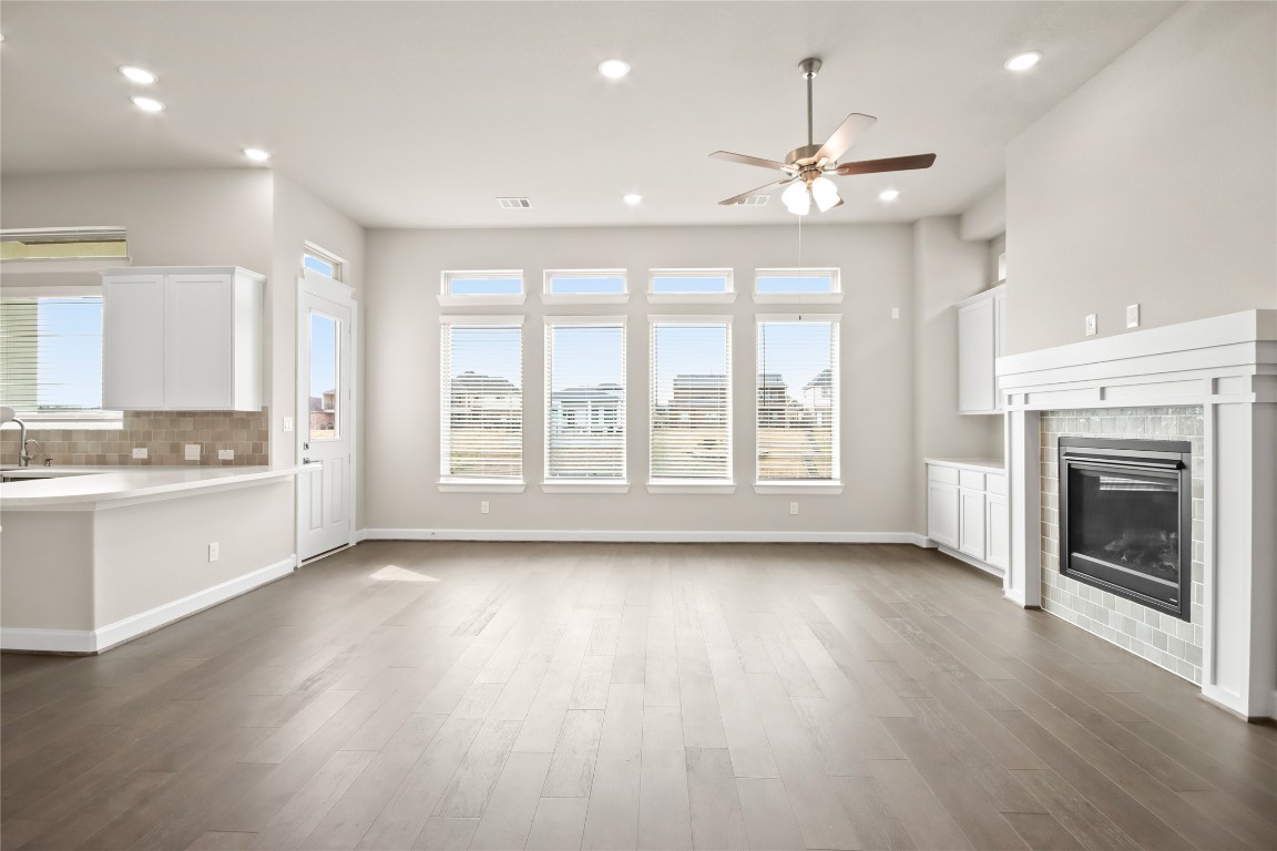 136 Peninsula Point Drive Montgomery, TX 77356 - Photo 28 of 30 a view of an empty room with window and wooden floor