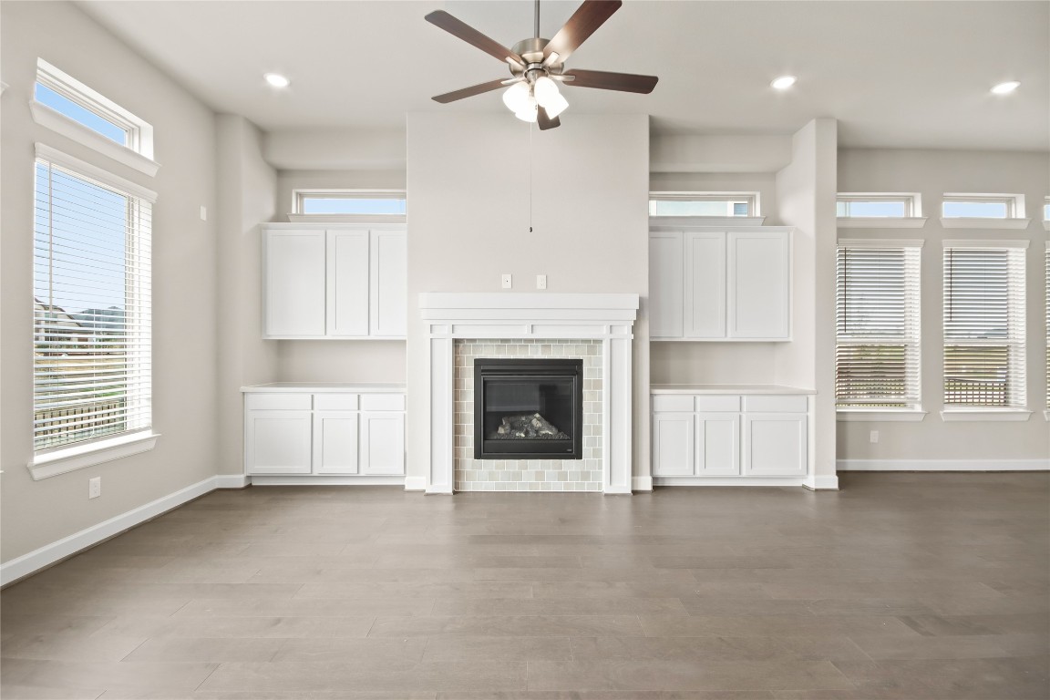136 Peninsula Point Drive Montgomery, TX 77356 - Photo 5 of 30 an empty room with windows and fireplace