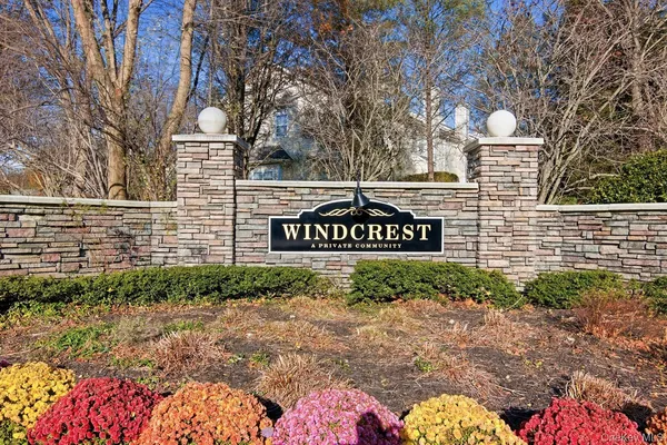 a view of outdoor space with signage and flags
