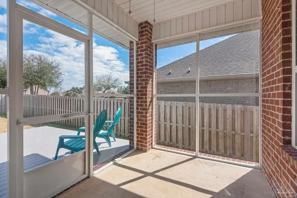 a balcony with a glass door
