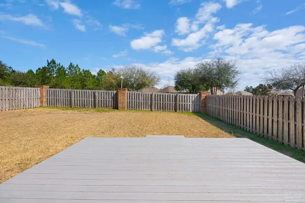 a view of swimming pool with a yard