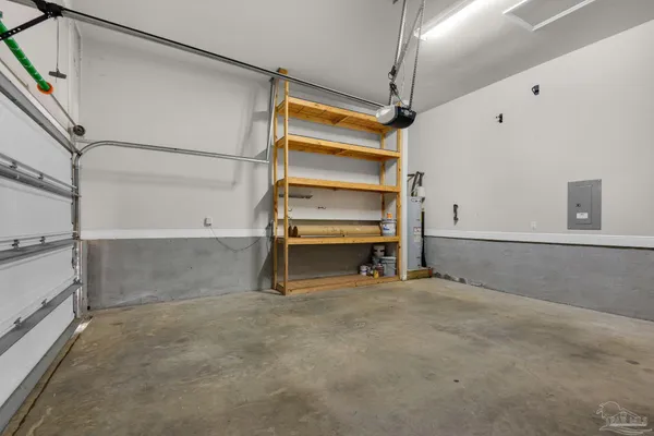 a view of an empty room with a cabinet