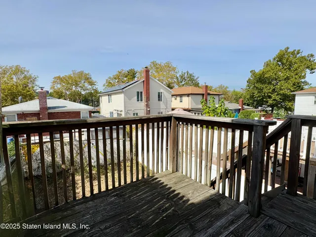 a view of a street from a balcony