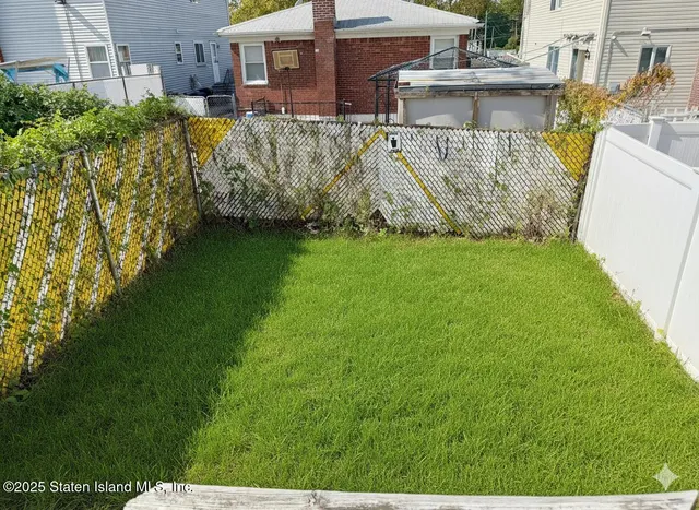 a view of a house with a garden
