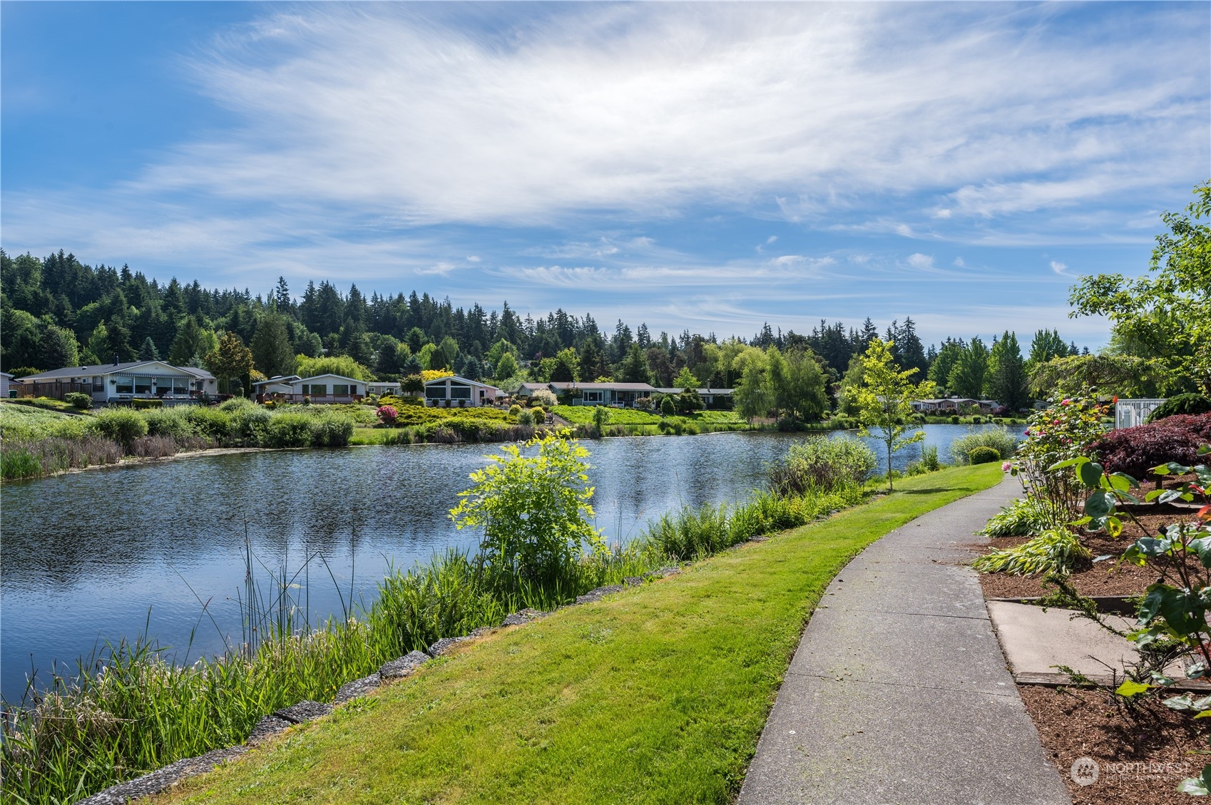 23803 Lake Drive West Bothell, WA 98021 - Photo 28 of 32 a view of a lake with a city
