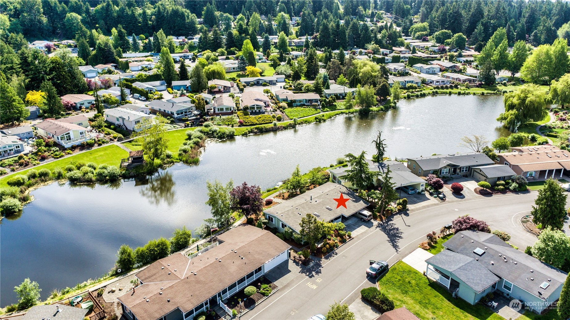 23803 Lake Drive West Bothell, WA 98021 - Photo 29 of 32 an aerial view of a house with a lake view