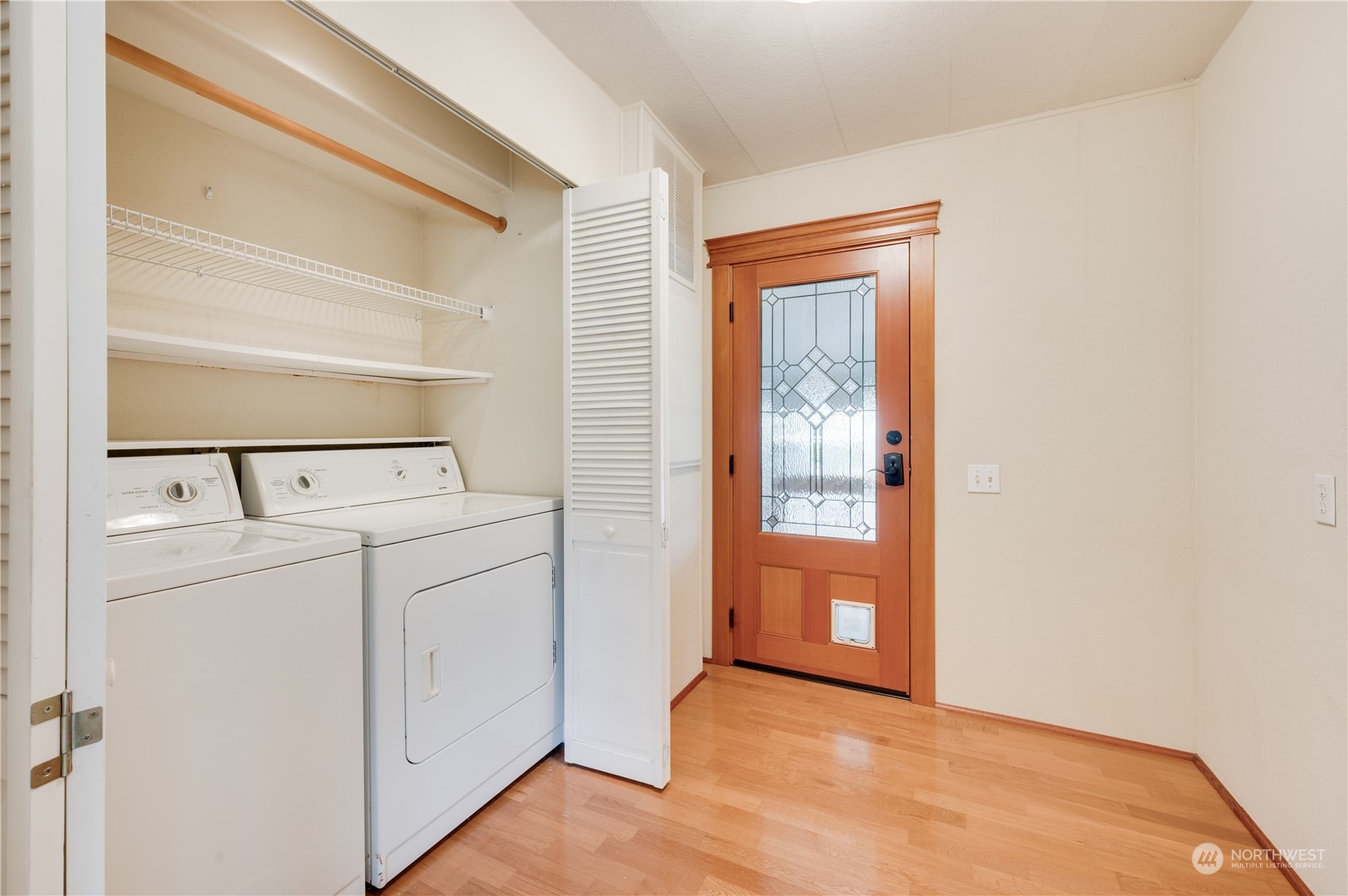 23803 Lake Drive West Bothell, WA 98021 - Photo 6 of 32 a view of washer and dryer
