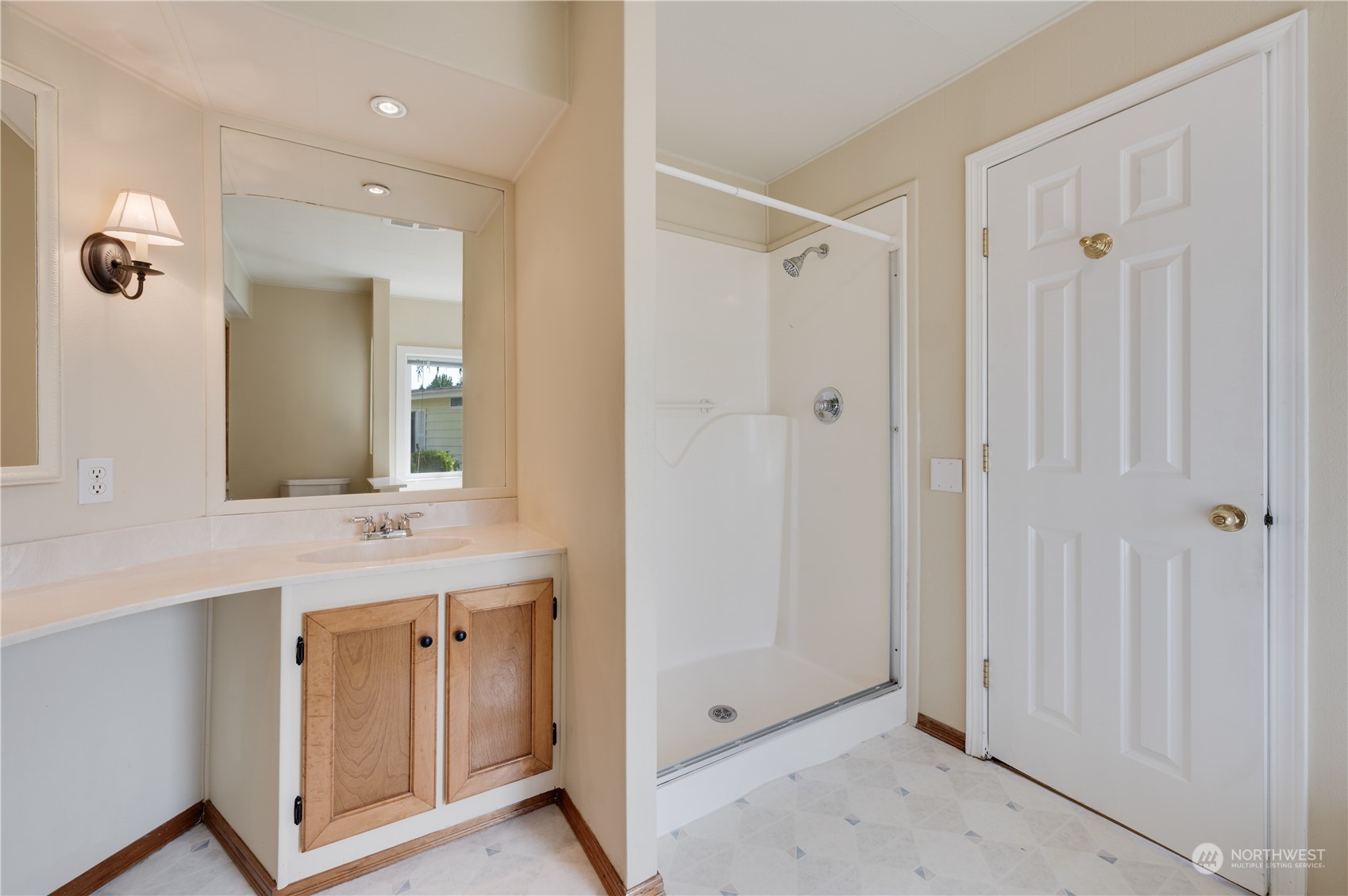 23803 Lake Drive West Bothell, WA 98021 - Photo 9 of 32 a spacious bathroom with a shower and a mirror