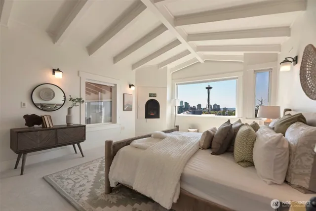 a large kitchen with a wooden floor and cabinets