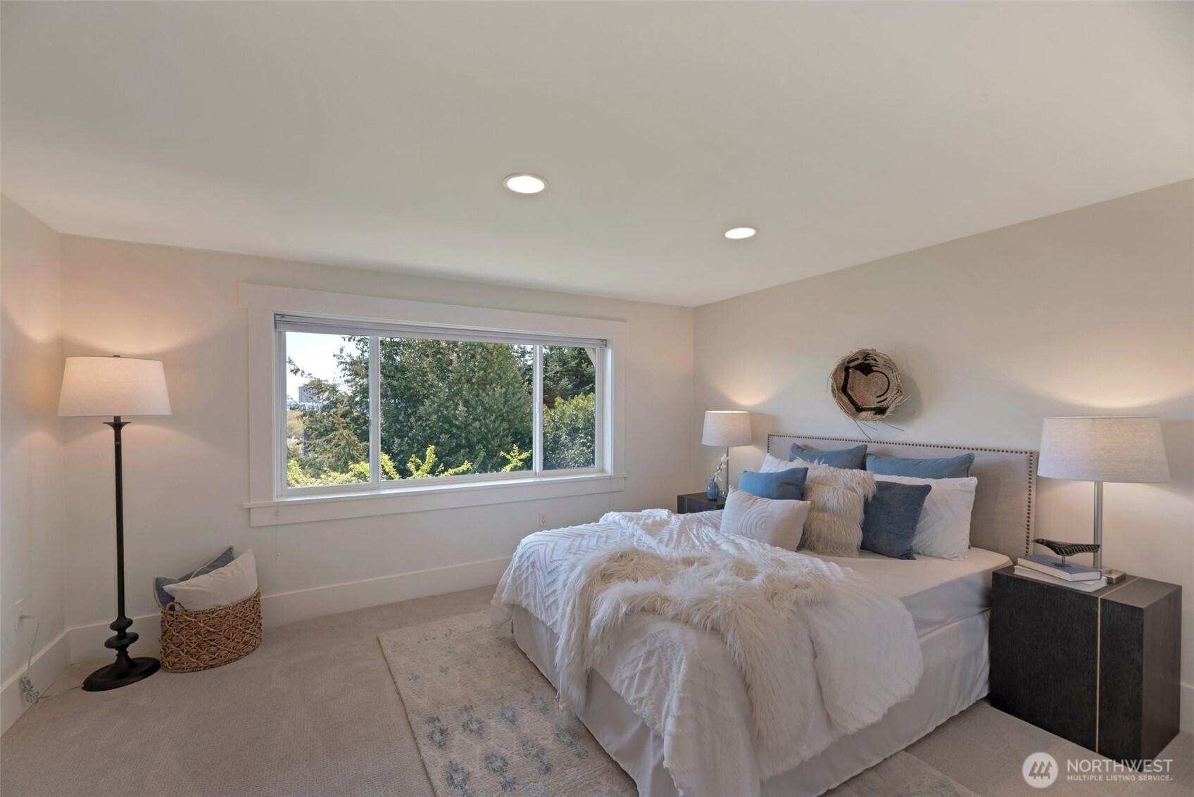 225 Ward Street Seattle, WA 98109 - Photo 27 of 36 a bedroom with a bed and window
