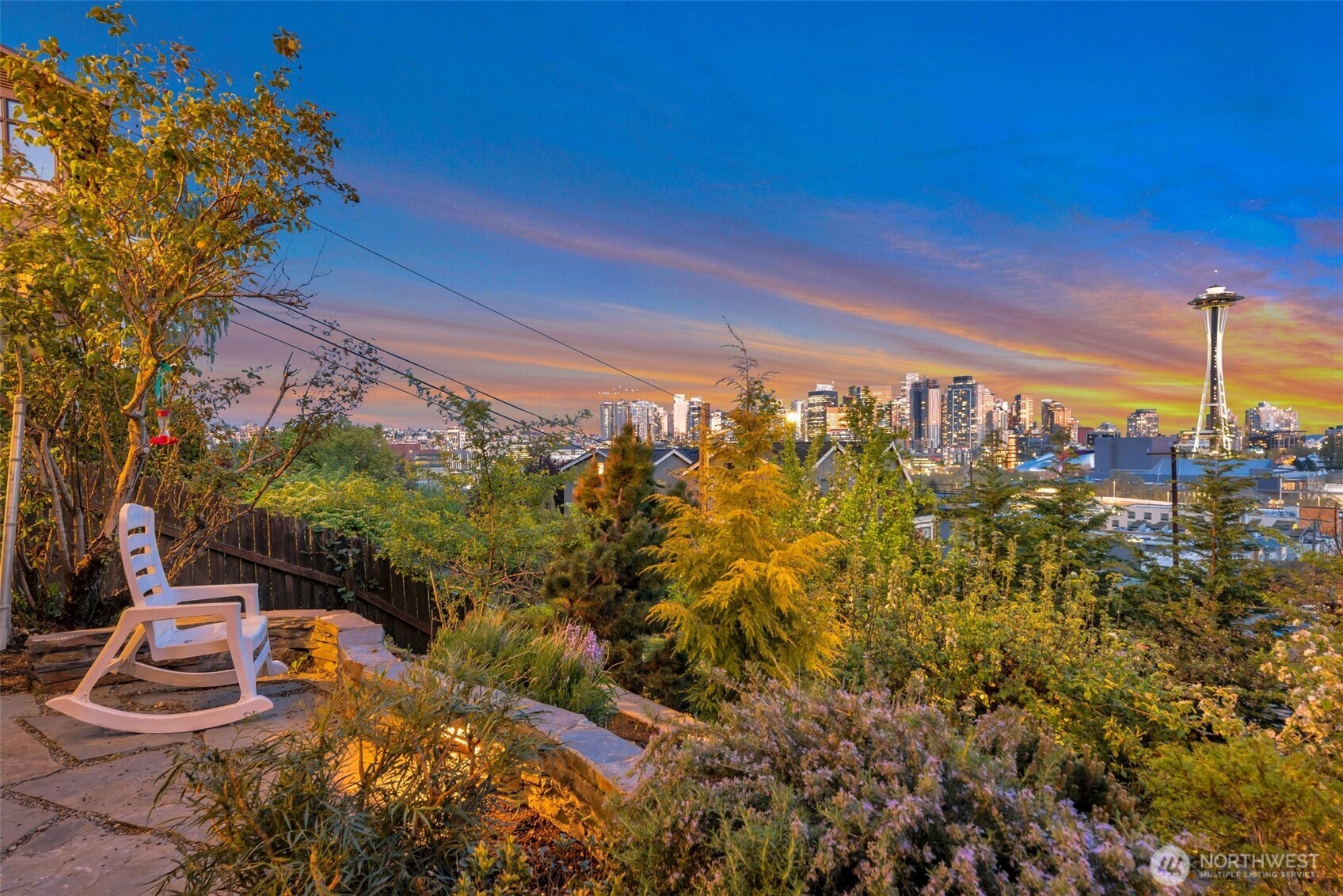 225 Ward Street Seattle, WA 98109 - Photo 7 of 36 a view of a city with flower plants and large trees