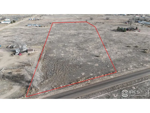 a black and white photo of a field