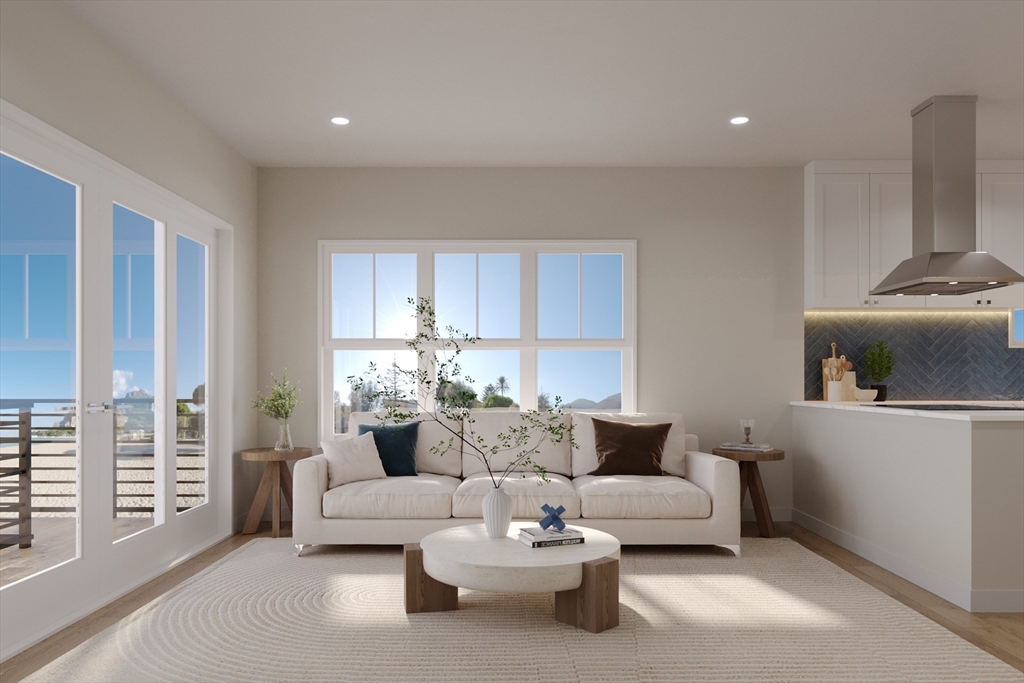 16 North End Boulevard, Unit 5 Salisbury, MA 01952 - Photo 2 of 14 a living room with furniture and a large window