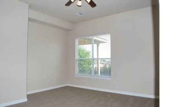 a view of a brick house with a window