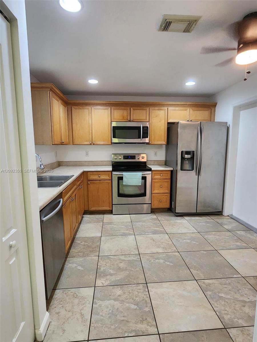 8014 Big Pine Way Riviera Beach, FL 33407 - Photo 6 of 24 Gallery Image 6