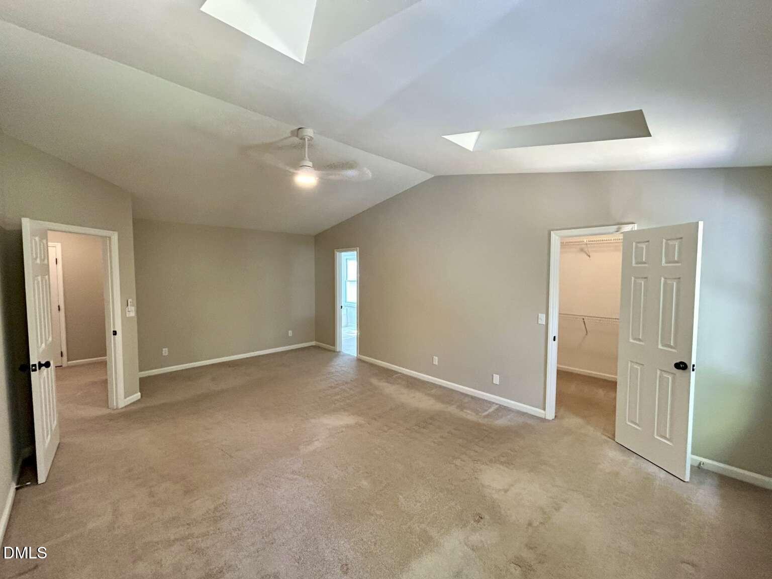 113 Ravenna Way Cary, NC 27513 - Photo 16 of 39 an empty room with closet and a ceiling fan